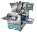 Depositor machine for versatile baked goods production